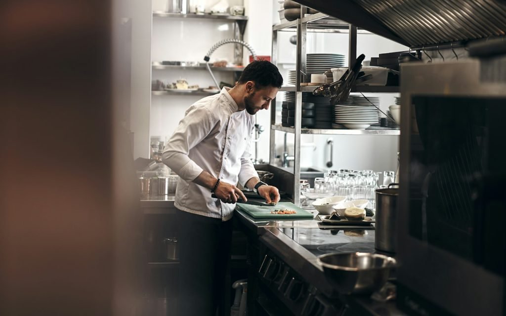 A chef working in a commercial kitchen