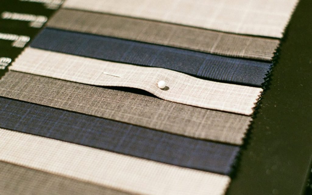 Close-up of wool, linen and cotton fabric swatches