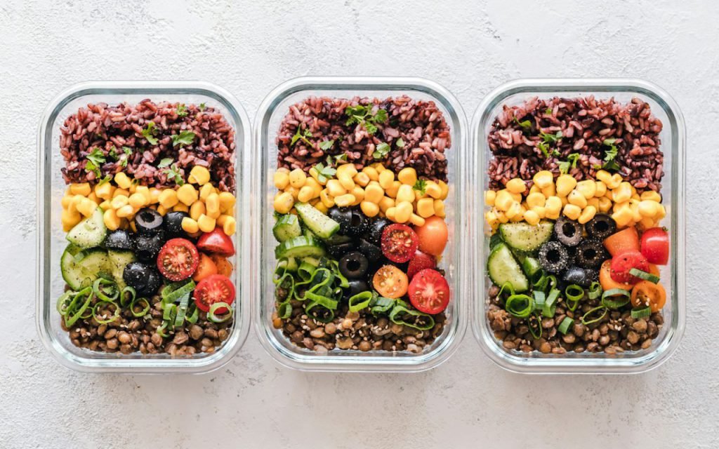 Glass meal prep containers filled with lunches for the week