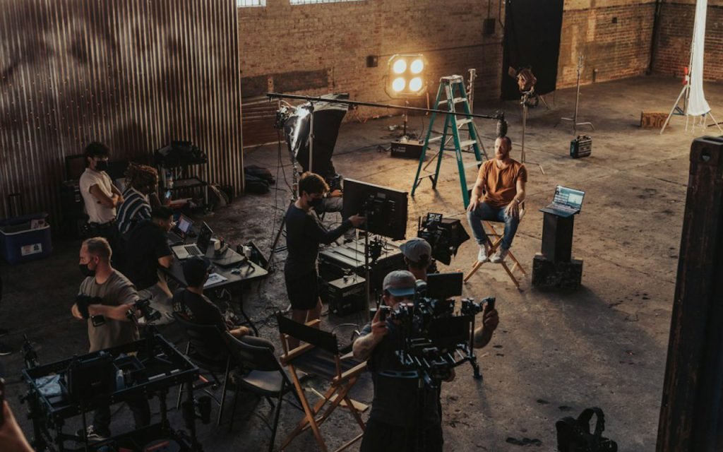 Studio lights glowing on an empty film set