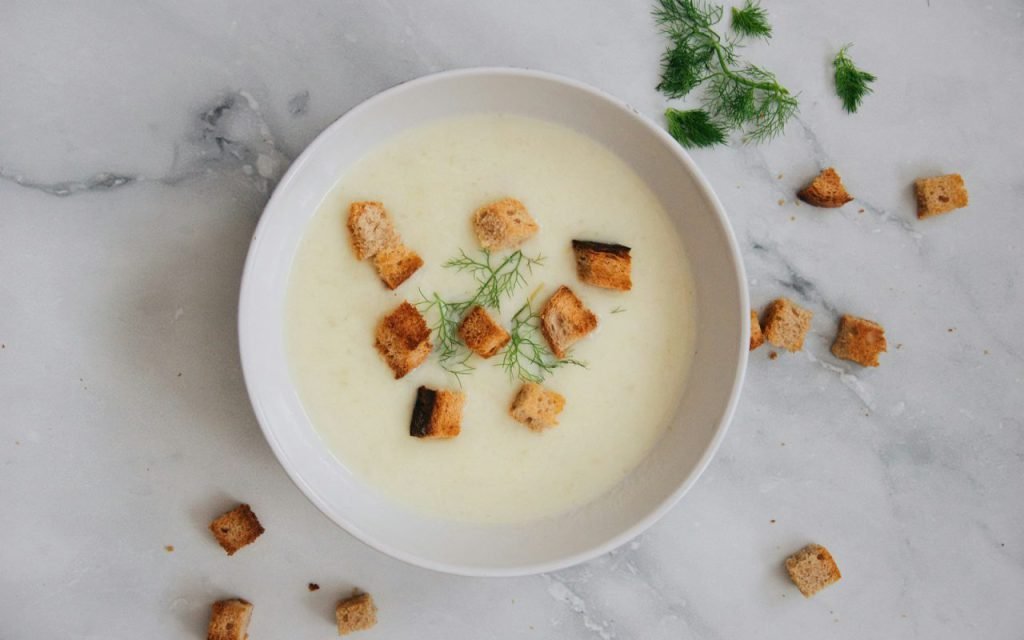 A bowl of creamy soup ready to serve
